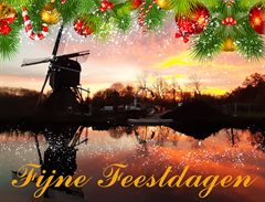 Afbeelding van de molen in Oudegein met kerstdecoratie. Fijne feestdagen.