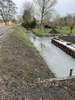 De kade langs de Lopikerwetering na afronding van het werk